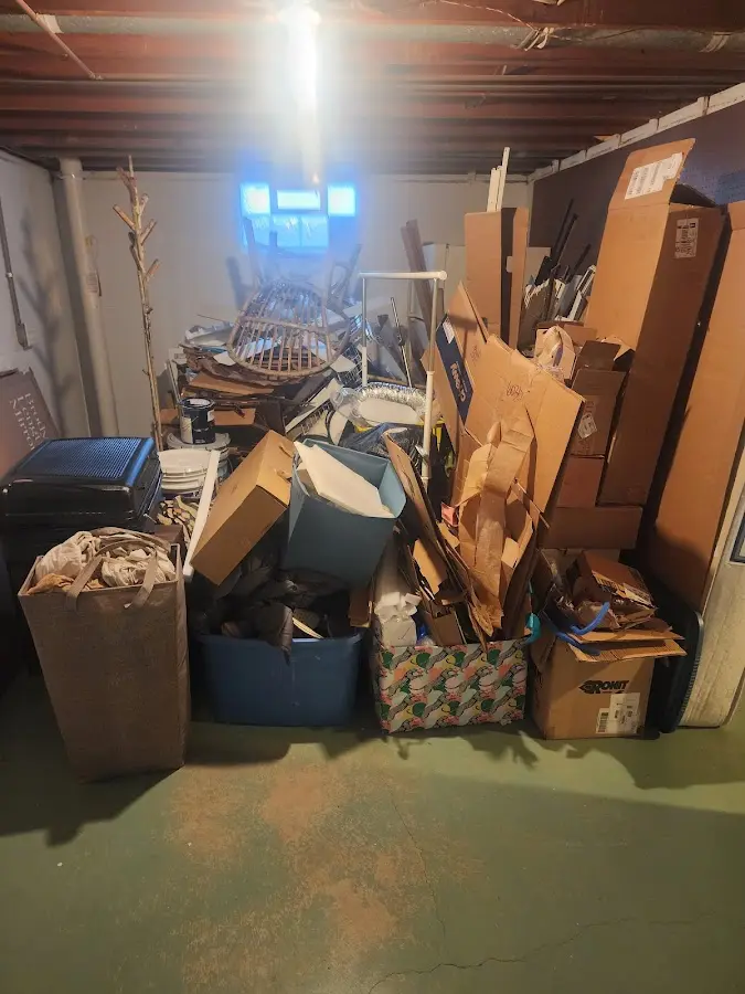 Roll-off dumpster container at job site for 2 Yard Dumpster Rental in Harrison